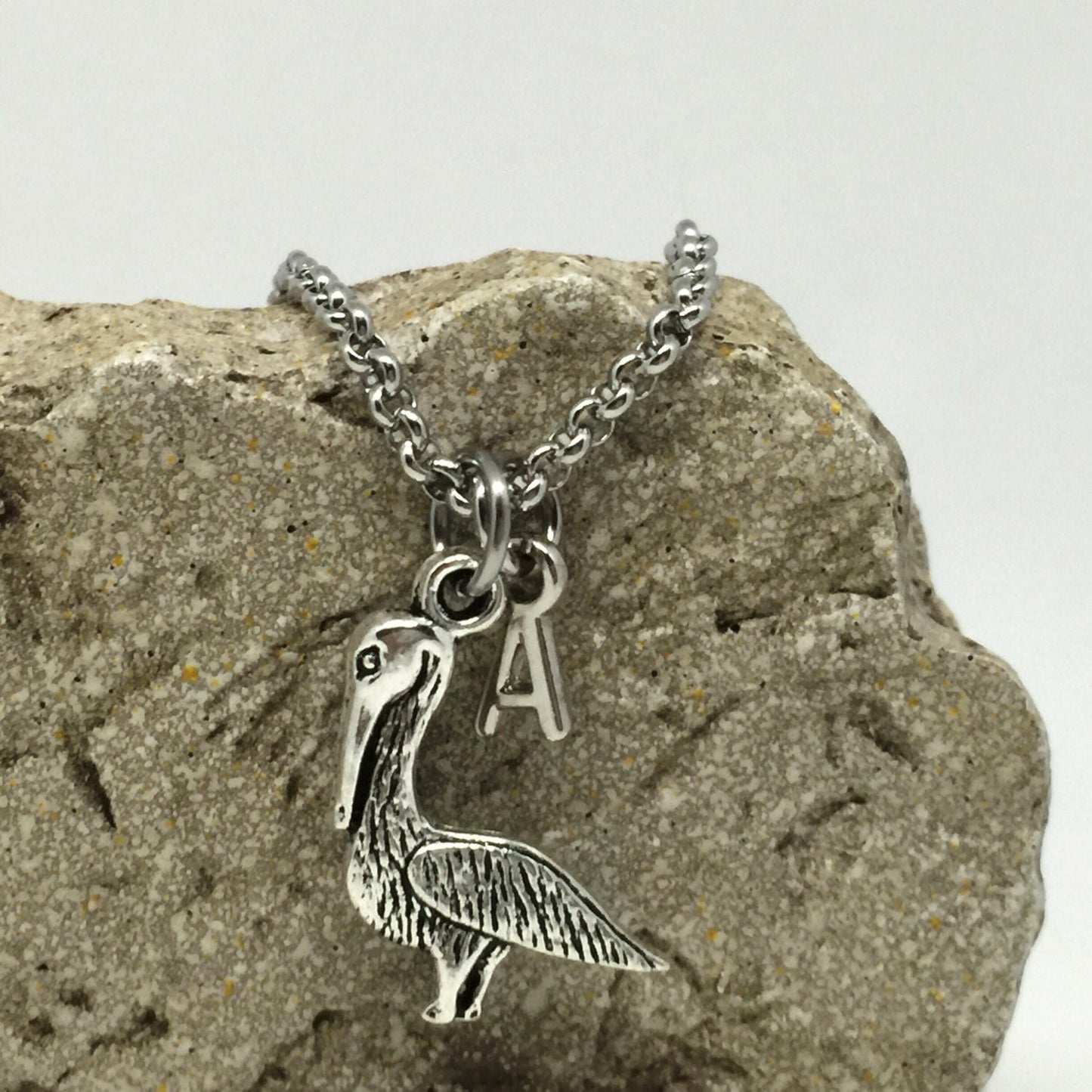 Pelican charm necklace stainless steel sterling silver initial choice save our seas